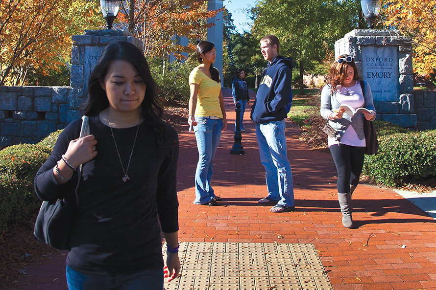 students walk through Oxford campus