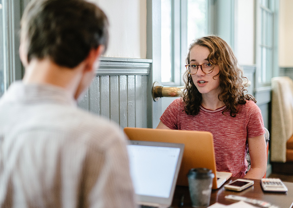 students engage in conversation