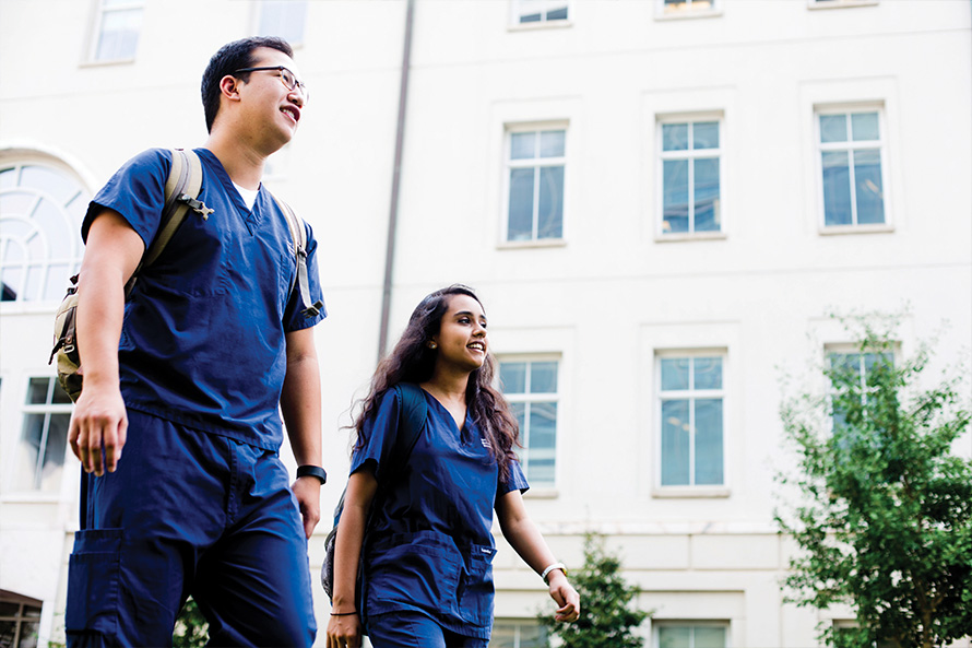 Nursing students walking on campus